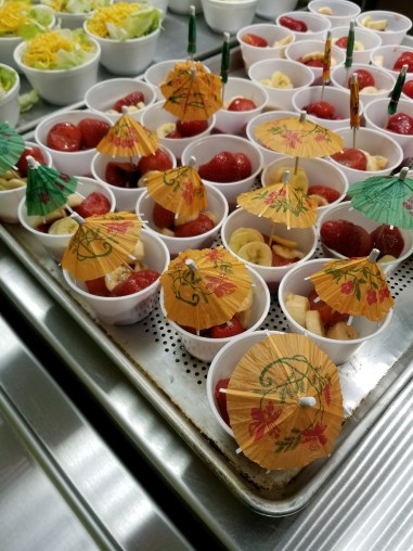Hawaiian cocktail style cups served as the fruit cups for the day.